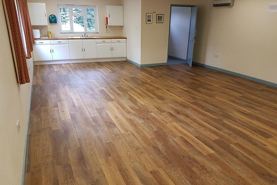 The main hall and kitchen at Stoborough village Hall with new Classic Limed Oak vinyl plank flooring from the Karndean Knight Tile Collection